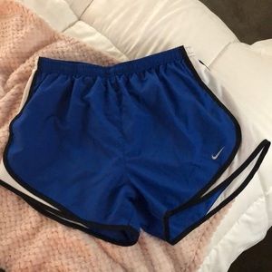 NIKE RUNNING SHORTS IN BLUE